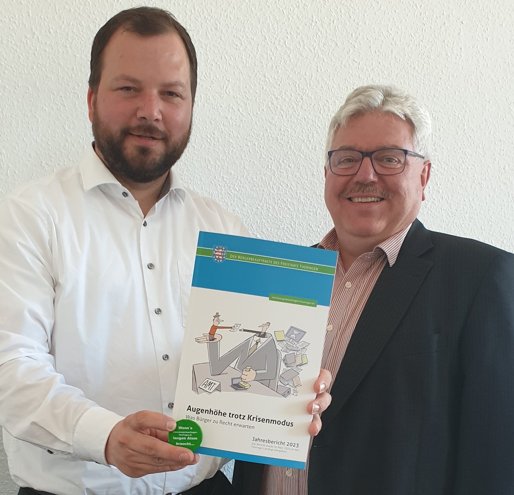Der Landrat und Herzberg mit Jahresbericht